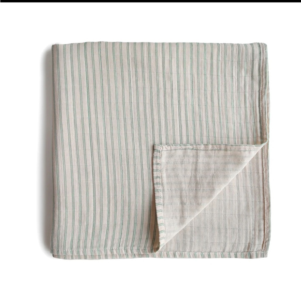 Mushie Swaddle Blanket in the color Sage Strip